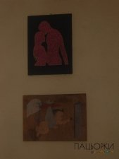 «Аист с ребенком из гвоздей и ниток»