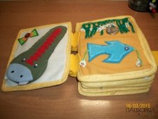 Розвиваюча книжка з тканини для дітей