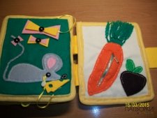 Розвиваюча книжка з тканини для дітей