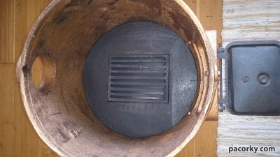 Чавунна кругла пічка з чавунцем